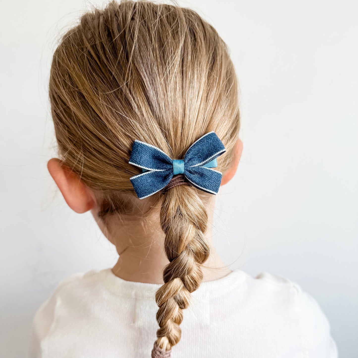 Denim pinch bow