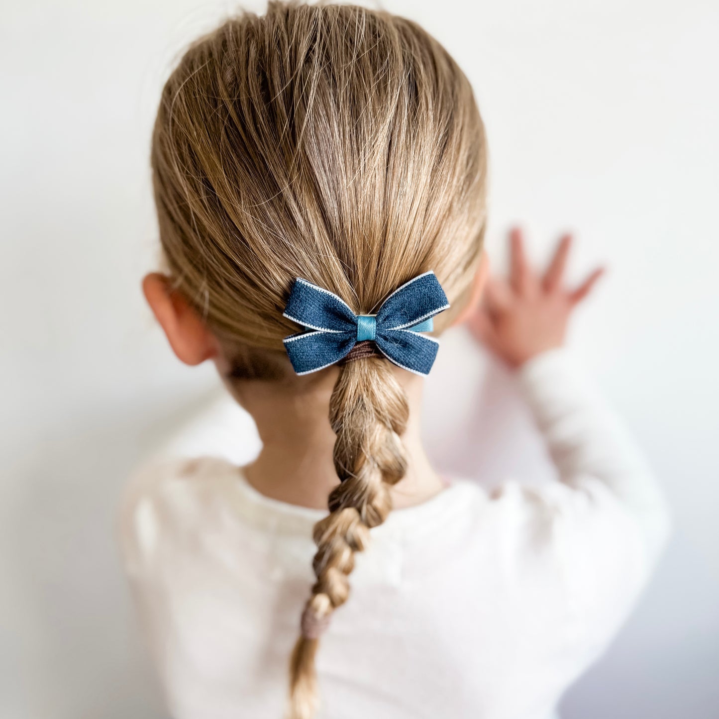 Denim pinch bow