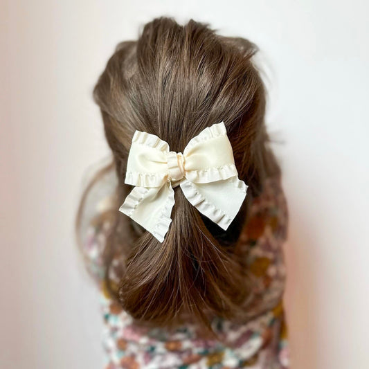 Champagne ruffle bow